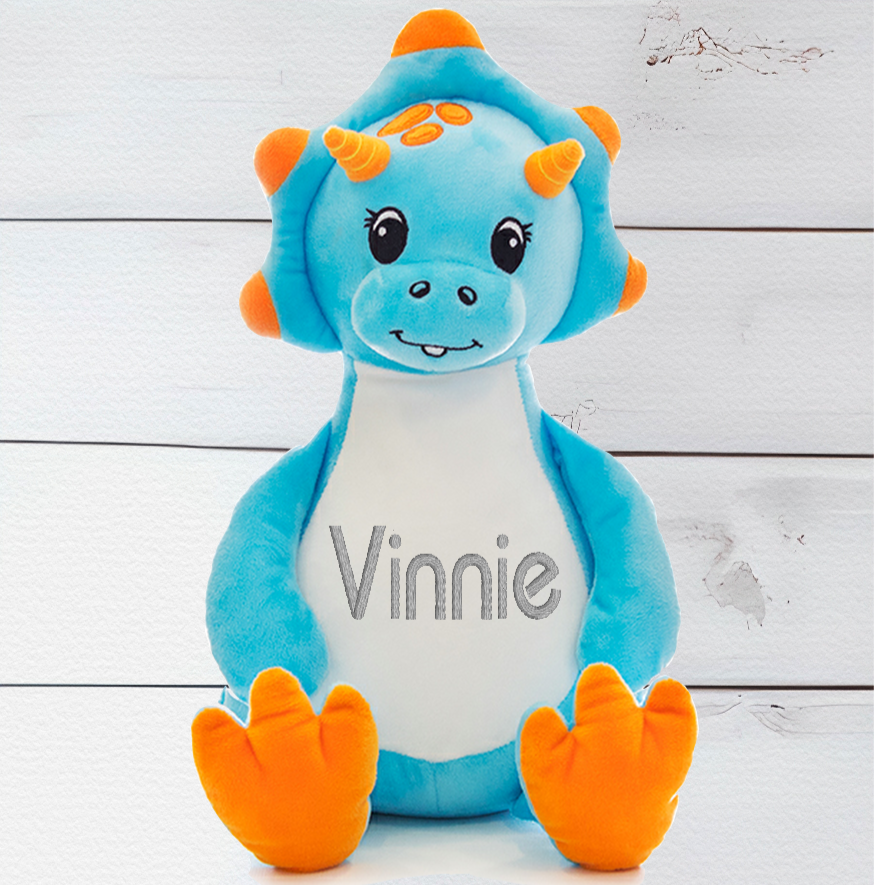 Sir Monty the Blue Dinosaur has a unique zip design which enables you to remove the inside stuffing pods and safely wash in the Machine washable. You can also fill Sir Monty with PJs etc and use them for a sleep over. Sir Monty the Blue Dinosaur is around 13 Inches in height. Begin customising your teddy bear by selecting from one of our themed designs .