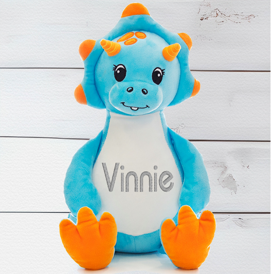 Sir Monty the Blue Dinosaur has a unique zip design which enables you to remove the inside stuffing pods and safely wash in the Machine washable. You can also fill Sir Monty with PJs etc and use them for a sleep over.  Sir Monty the Blue Dinosaur is around 13 Inches in height.  Begin customising your teddy bear by selecting from one of our themed designs .