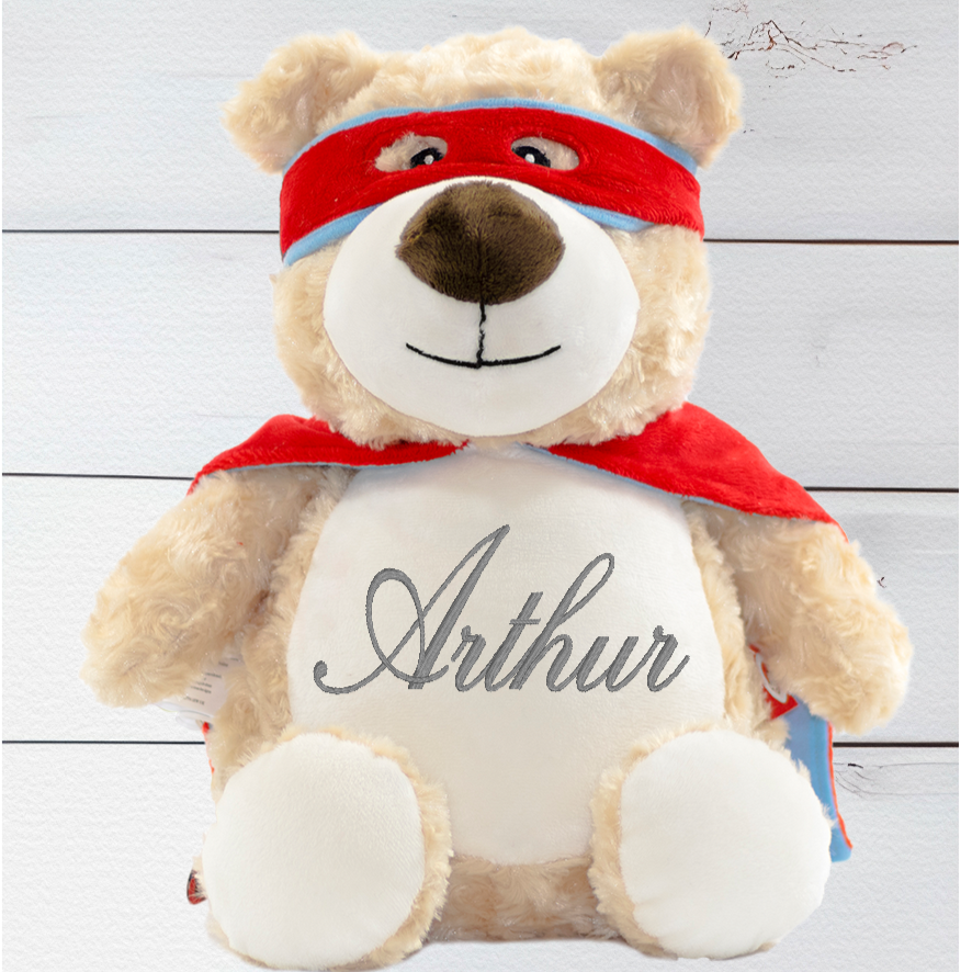 Cubbyford the Hero Bear is a versatile lil' pal! With his special zip design, his inside stuffing pods can be removed so you can safely clean him. Plus, Toss in some PJs and he's ready for a sleepover - no problemo! Cubbyford stands at a proud 13 inches. Personalise your teddy bear by selecting from one of our themed designs.