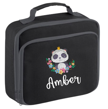 Introducing the ultra-stylish, Personalised Lunch Box Cooler! It's the total package: Zippered front pocket for easy customization. Zippered main compartment. Fully insulated. Wipeable interior. Internal ID label.  Colour - Black Adjustment handle from 7.5cm to 8cm. Reach certified.  Choose between 4 colours - Jet Black, Jungle Camo, Navy Blue, Pretty in Pink!  Rucksack Dimensions 24 x 20 x 8cm. 3 litres.  Personalisation comes complimentary - no extra cost!