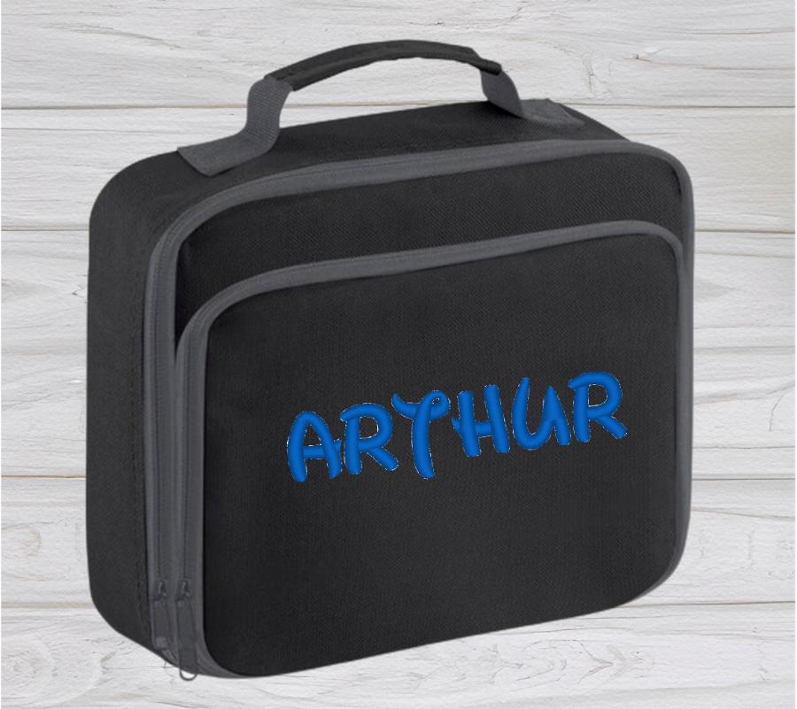 Introducing the ultra-stylish, Personalised Lunch Box Cooler! It's the total package: Zippered front pocket for easy customization. Zippered main compartment. Fully insulated. Wipeable interior. Internal ID label.  Colour - Black Adjustment handle from 7.5cm to 8cm. Reach certified. Dimensions 24 x 20 x 8cm. 3 litres.  Choose between 4 colours - Jet Black, Jungle Camo, Navy Blue, Pretty in Pink!  Personalisation comes complimentary - no extra cost!