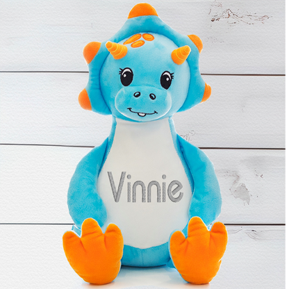 Sir Monty the Blue Dinosaur has a unique zip design which enables you to remove the inside stuffing pods and safely wash in the Machine washable. You can also fill Sir Monty with PJs etc and use them for a sleep over.  Sir Monty the Blue Dinosaur is around 13 Inches in height.  Begin customising your teddy bear by selecting from one of our themed designs .