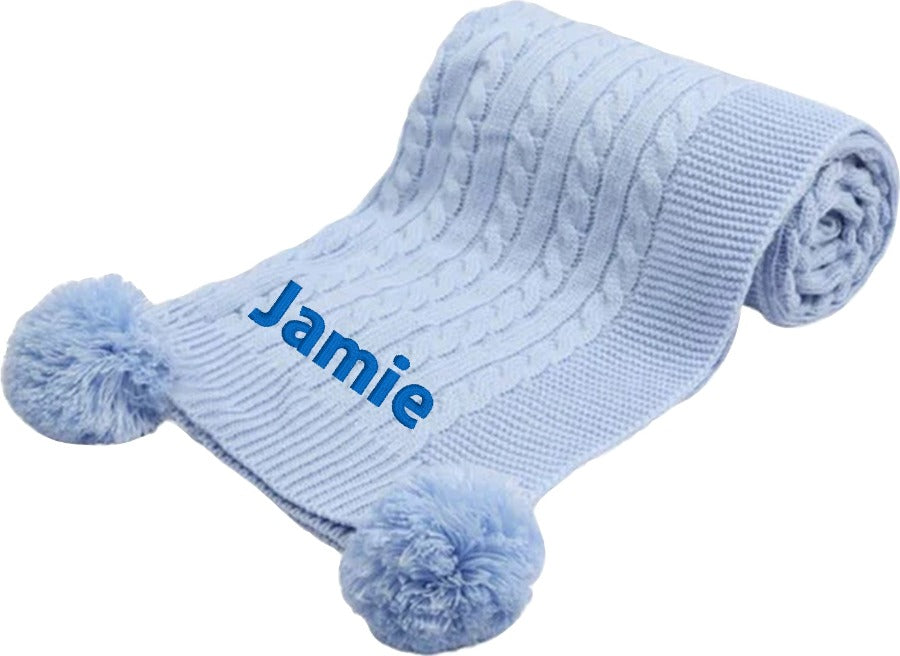 Treat a special little boy to the perfect gift! Our exclusive baby cable knitted pom pom blanket, in stunning Blue, is customised with her name and desired font style and colour. Soft and cuddly, it's ideal for any cot or pram and measures 70 x 100 cm. Make him feel extra special with a personalised embroidered Blue cable knitted blanket!