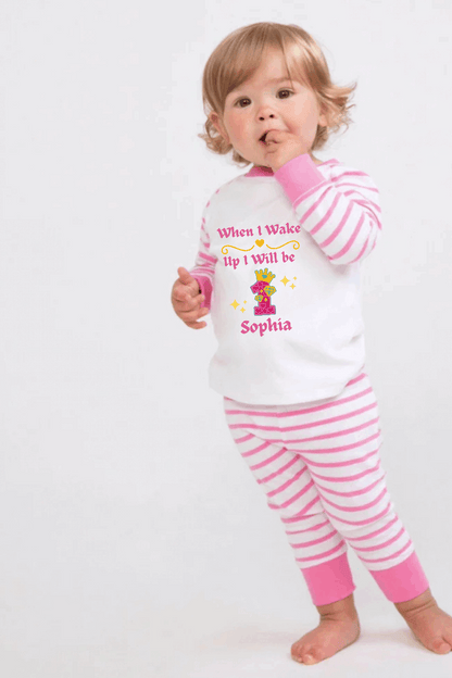 Searching for the perfect wake up PJs for your little girl? Look no more! Our one-of-a-kind "When I Wake Up"&nbsp; Princess Age design set is the perfect addition to any birthday bash. Personalized with a name and princess themed age, these jammies come in both Solid Pink &amp; White, Pink Candy Striped &amp; White.&nbsp;  Enhance your sleepwear with our exquisite Princess Themed Age Design.  Made with 100% cotton and a bold print, these PJs make a fab birthday present!