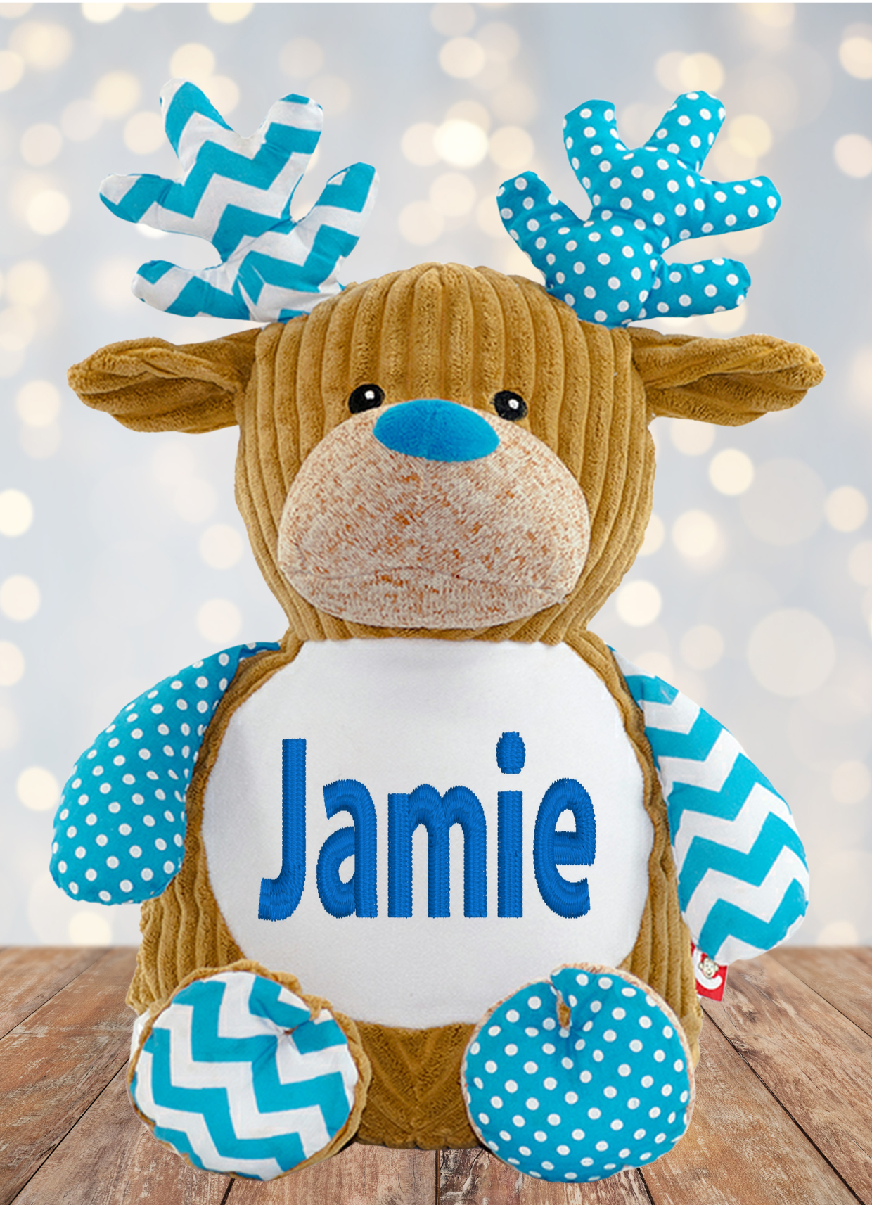 Dasher the Blue Reindeer Cubbies Teddy Bear is sure to leave you and your loved ones smitten with its corduroy brown body, sweetly-decorated antlers, arms, and feet, and sweet black eyes. Make it truly unique with a personalised design and make those special moments even more unforgettable!

This gorgeously crafted 13" Dasher Teddy can be taken apart with its zipper design - so it's easy to give them a wash in the machine before slumber party night! Make those Christmas gatherings extra snug and cosy with t
