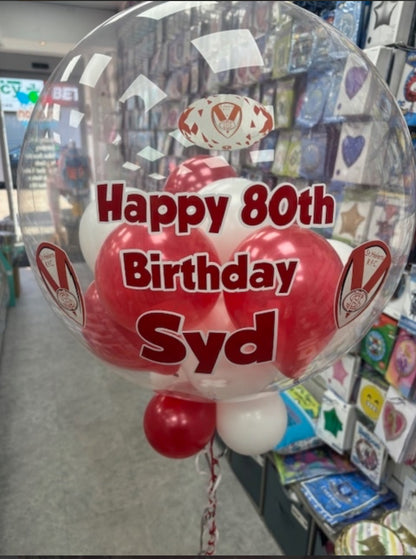 Helium inflated 24 inch personalised bubble balloon, personalised in the theme The Saints Rugby red, white mini balloons with white and red personalisation.
