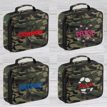 Introducing the ultra-stylish, Personalised Lunch Box Cooler! It's the total package: Zippered front pocket for easy customization. Zippered main compartment. Fully insulated. Wipeable interior. Internal ID label.  Colour - Camouflage Adjustment handle from 7.5cm to 8cm. Reach certified. Dimensions 24 x 20 x 8cm. 3 litres.  Choose between 4 colours - Jet Black, Jungle Camo, Navy Blue, Pretty in Pink!  Personalisation comes complimentary - no extra cost!