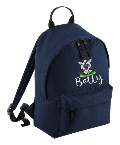 Introducing the fabulously fashionable, petite-sized Personalised Mini School Backpack! It's got it all: a nifty zippered front pocket, extra-cushy back panel and adjustable shoulder straps, plus a handy grab handle to boot!  Colour - Navy Blue Rucksack Dimensions - 24 x 33 x 17cm. Capacity 9 litres.  Choose between 4 colours - Jet Black, Jungle Camo, Navy Blue, Pretty in Pink!  Personalisation comes complimentary - no extra cost!