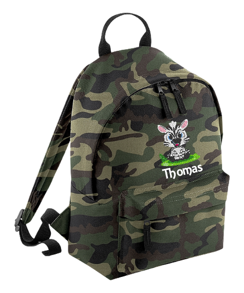 Introducing the fabulously fashionable, petite-sized Personalised Mini School Backpack! It's got it all: a nifty zippered front pocket, extra-cushy back panel and adjustable shoulder straps, plus a handy grab handle to boot!  Colour - Jungle Camo Rucksack Dimensions - 24 x 33 x 17cm. Capacity 9 litres.  Choose between 4 colours - Jet Black, Jungle Camo, Navy Blue, Pretty in Pink!  Personalisation comes complimentary - no extra cost!