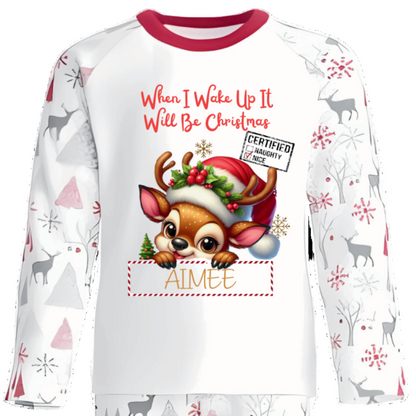 Celebrate the magic of Christmas Eve in these snug personalised pyjamas, featuring a cute Peeking Christmas Reindeer Design. With the cheerful phrase “When I Wake Up It Will Be Christmas,” they capture the excitement of the countdown in the coziest, most delightful way.