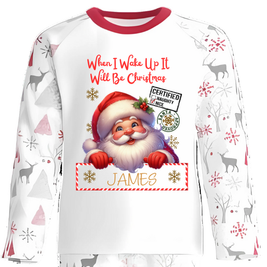 Celebrate the magic of Christmas Eve in these snug personalised pyjamas, featuring a cute Peeking Christmas Santa Design. With the cheerful phrase “When I Wake Up It Will Be Christmas,” they capture the excitement of the countdown in the coziest, most delightful way.