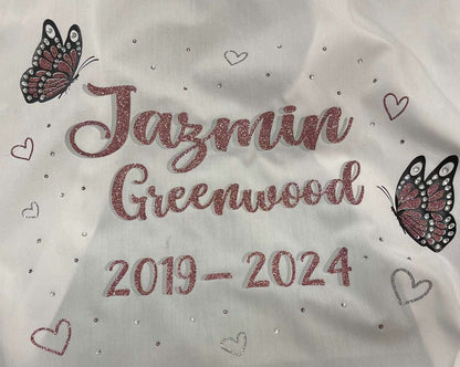 Custom Class of 2026 glitter and diamanté glitter pink butterfly signing shirt with glitter silver and pink hearts, personalized name and dates.
