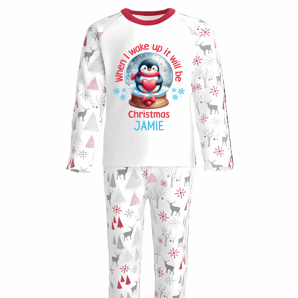 Bring the magic of Christmas Eve to life with our luxury personalised pyjamas, beautifully designed with festive Penguin &amp; Christmas Snow Globe details. Featuring the joyful phrase “When I Wake Up It Will Be Christmas”, these pyjamas capture the excitement of the night before Christmas in the cosiest way possible.