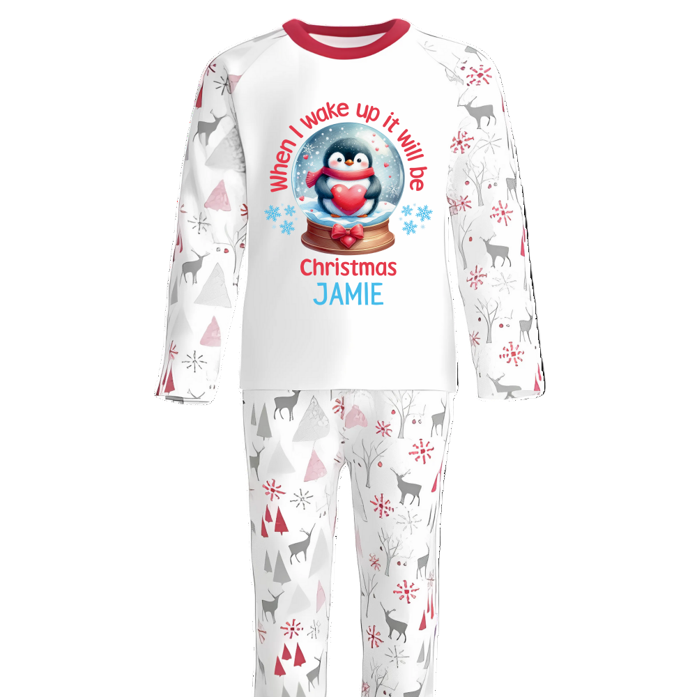 Bring the magic of Christmas Eve to life with our luxury personalised pyjamas, beautifully designed with festive Penguin &amp; Christmas Snow Globe details. Featuring the joyful phrase “When I Wake Up It Will Be Christmas”, these pyjamas capture the excitement of the night before Christmas in the cosiest way possible.