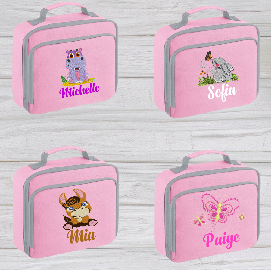 Introducing the ultra-stylish, Personalised embroidery Lunch Box Cooler! It's the total package: Zippered front pocket for easy customization. Zippered main compartment. Fully insulated. Wipeable interior. Internal ID label.  Colour - Pink Adjustment handle from 7.5cm to 8cm. Reach certified.  Choose between 4 colours - Jet Black, Jungle Camo, Navy Blue, Pretty in Pink!  Rucksack Dimensions 24 x 20 x 8cm. 3 litres.  Personalisation embroidery comes complimentary - no extra cost!