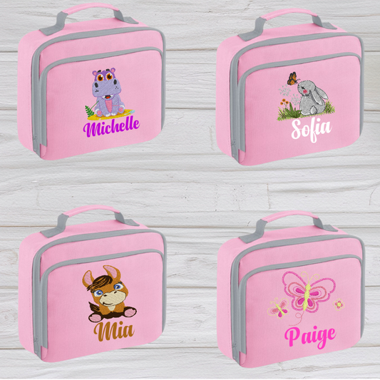 Introducing the ultra-stylish, Personalised embroidery Lunch Box Cooler! It's the total package: Zippered front pocket for easy customization. Zippered main compartment. Fully insulated. Wipeable interior. Internal ID label.  Colour - Pink Adjustment handle from 7.5cm to 8cm. Reach certified.  Choose between 4 colours - Jet Black, Jungle Camo, Navy Blue, Pretty in Pink!  Rucksack Dimensions 24 x 20 x 8cm. 3 litres.  Personalisation embroidery comes complimentary - no extra cost!