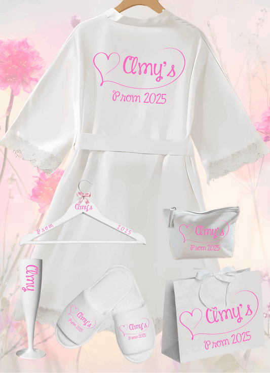Step into a world of elegance with the perfect personalised Prom lace robe and accessories, including Hangers, Make Up Bags, Wine Flute, Spa Slippers, Gift Bag. Crafted from a stunning combination of delicate lace and luxurious satin, this robe is the epitome of sophistication and comfort.