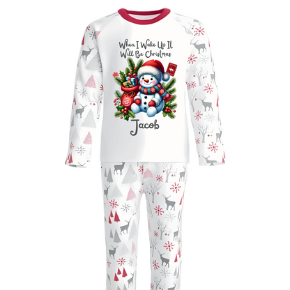Celebrate the magic of Christmas Eve in these snug personalised pyjamas, featuring a cute Sitting Snowman and a festive Gift Bag. With the cheerful phrase “When I Wake Up It Will Be Christmas,” they capture the excitement of the countdown in the coziest, most delightful way.