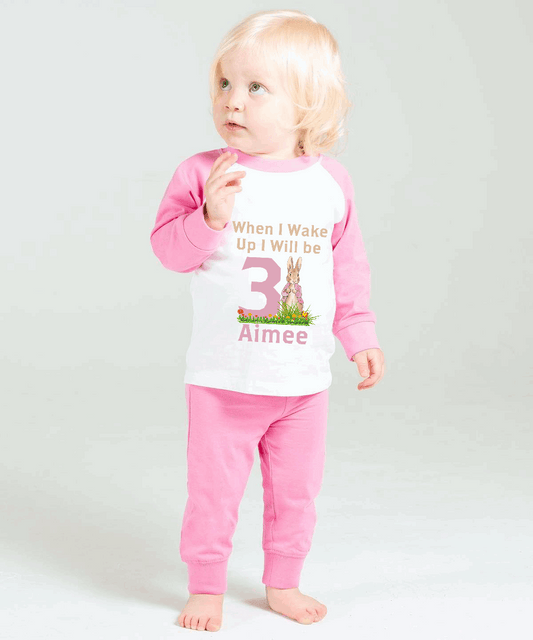 Add to the birthday celebrations with our cute Flopsy from Peter Rabbit style “When I Wake Up” character pyjama’s. Personalise with a name and age, and select from a choice of pyjama in both Pink or Candy Striped style. Make their special day even more exciting with our adorable Flopsy from Peter Rabbit themed "When I Wake Up" character pajamas