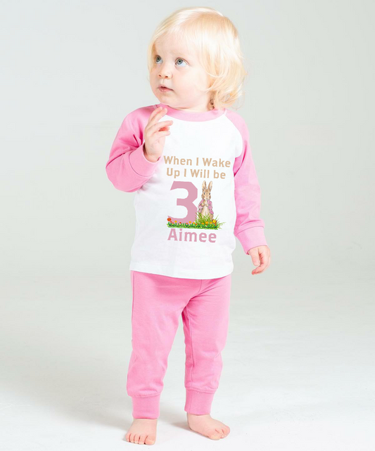Add to the birthday celebrations with our cute Flopsy from Peter Rabbit style “When I Wake Up” character pyjama’s. Personalise with a name and age, and select from a choice of pyjama in both Pink or Candy Striped style. Make their special day even more exciting with our adorable Flopsy from Peter Rabbit themed "When I Wake Up" character pajamas