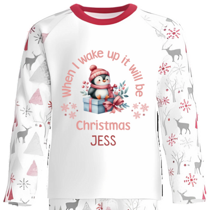 Capture the wonder of Christmas Eve with these cozy personalised pyjamas, adorned with an adorable penguin perched on a festive gift. Printed with the fun phrase “When I Wake Up It Will Be Christmas,” they perfectly wrap the thrill of the countdown in comfy, charming style.