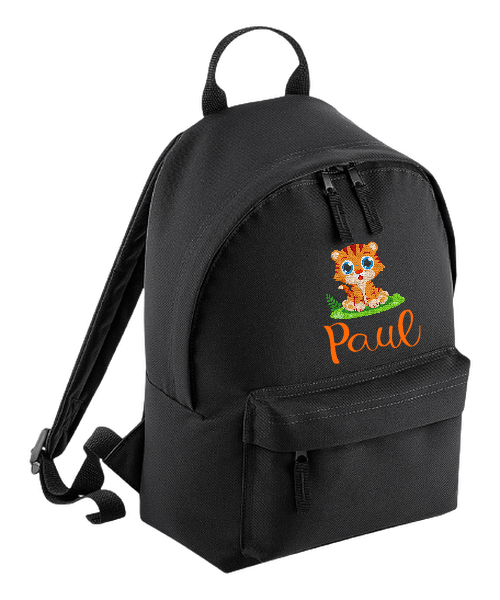 Introducing the fabulously fashionable, petite-sized Personalised Mini School Backpack! It's got it all: a nifty zippered front pocket, extra-cushy back panel and adjustable shoulder straps, plus a handy grab handle to boot!  Colour - Black Rucksack Dimensions - 24 x 33 x 17cm. Capacity 9 litres.  Choose between 4 colours - Jet Black, Jungle Camo, Navy Blue, Pretty in Pink!  Personalisation comes complimentary - no extra cost!