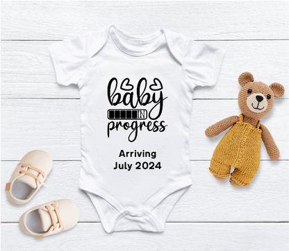 Capture your pregnancy announcement with this adorable personalised Baby in Progress baby grow! Personalised with Arrival Month; Year. Inform all your family, friends and even the world in the best way possible with a personalised short sleeved bodysuit. Share your excitement on social media platforms with the unique touch of a custom baby bodysuit. It also makes for the perfect baby shower gift.