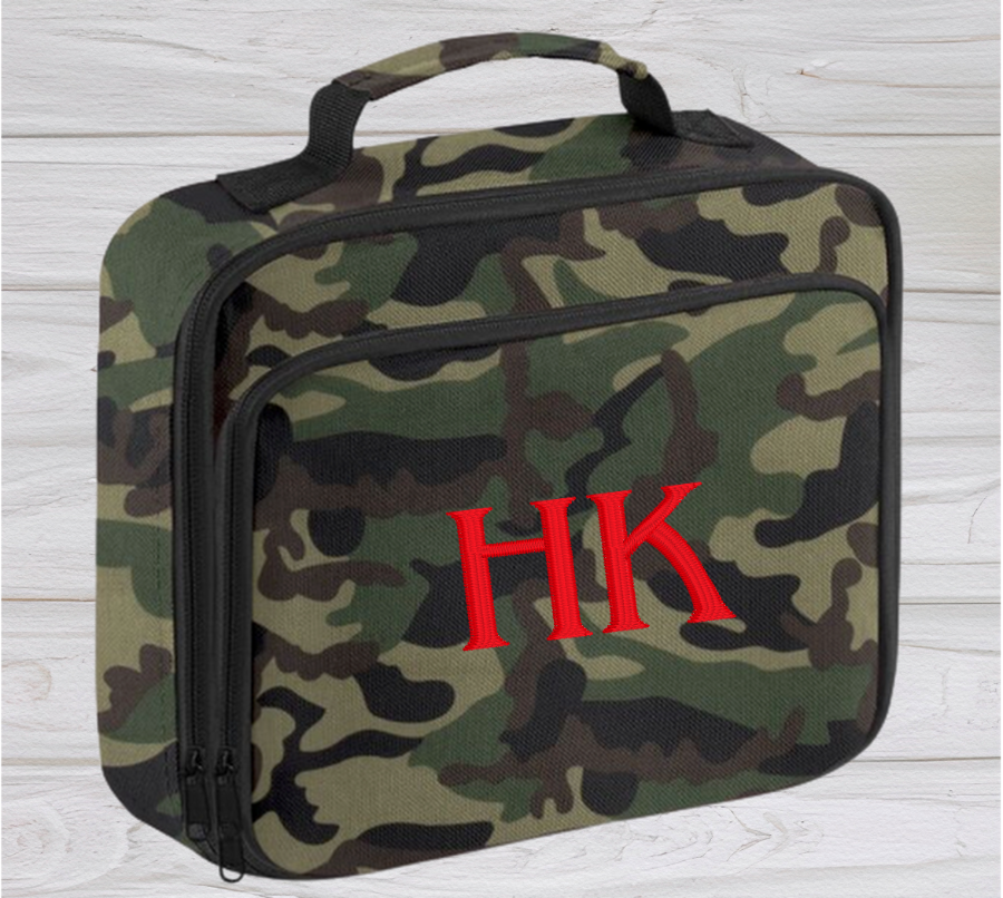 Introducing the ultra-stylish, Personalised Lunch Box Cooler! It's the total package: Zippered front pocket for easy customization. Zippered main compartment. Fully insulated. Wipeable interior. Internal ID label.  Colour - Camouflage Adjustment handle from 7.5cm to 8cm. Reach certified. Dimensions 24 x 20 x 8cm. 3 litres.  Choose between 4 colours - Jet Black, Jungle Camo, Navy Blue, Pretty in Pink!  Personalisation comes complimentary - no extra cost!