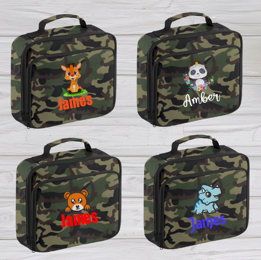 Introducing the ultra-stylish, Personalised Lunch Box Cooler! It's the total package: Zippered front pocket for easy customization. Zippered main compartment. Fully insulated. Wipeable interior. Internal ID label.  Colour - Camo Adjustment handle from 7.5cm to 8cm. Reach certified.  Choose between 4 colours - Jet Black, Jungle Camo, Navy Blue, Pretty in Pink!  Rucksack Dimensions 24 x 20 x 8cm. 3 litres.  Personalisation comes complimentary - no extra cost!