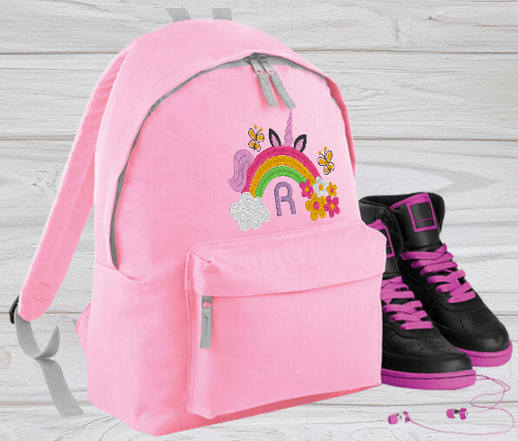 Our personalised Junior Pink School Rucksack Backpack has got it all: a zippered front pocket, comfy padded back panel, adjustable straps for extra support and a handy grab handle. Enjoy your schooldays in style! Going back to school with you very own personalised school bag.  Colour - Pink Rucksack Dimensions 28 x 38 x 19cm. Capacity 12 litres.   (Other colours Burgundy, French Navy, Black, Jungle Camo, Navy Blue, Fuchsia Pink, Purple, Red, Royal Blue, and Surf Blue - take your pick!)