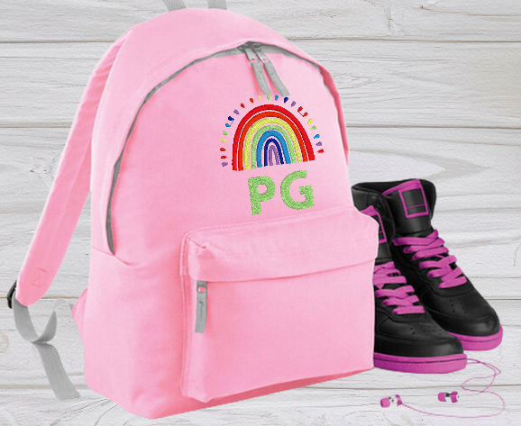 Our personalised Junior Pink School Rucksack Backpack has got it all: a zippered front pocket, comfy padded back panel, adjustable straps for extra support and a handy grab handle. Enjoy your schooldays in style! Going back to school with you very own personalised school bag.  Colour - Pink Rucksack Dimensions 28 x 38 x 19cm. Capacity 12 litres.   (Other colours Burgundy, French Navy, Black, Jungle Camo, Navy Blue, Fuchsia Pink, Purple, Red, Royal Blue, and Surf Blue - take your pick!)