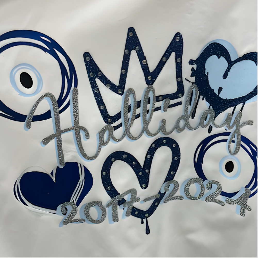 Leavers signing shirt with glitter blue and silver text and heart designs. Includes evil eyes,, crown design with baby blue.