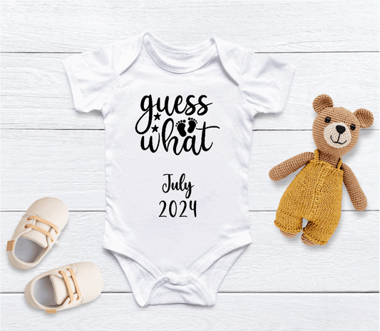 Capture your pregnancy announcement with this adorable personalised Guess What baby grow! Personalised with Arrival Month; Year. Inform all your family, friends and even the world in the best way possible with a personalised short sleeved bodysuit.