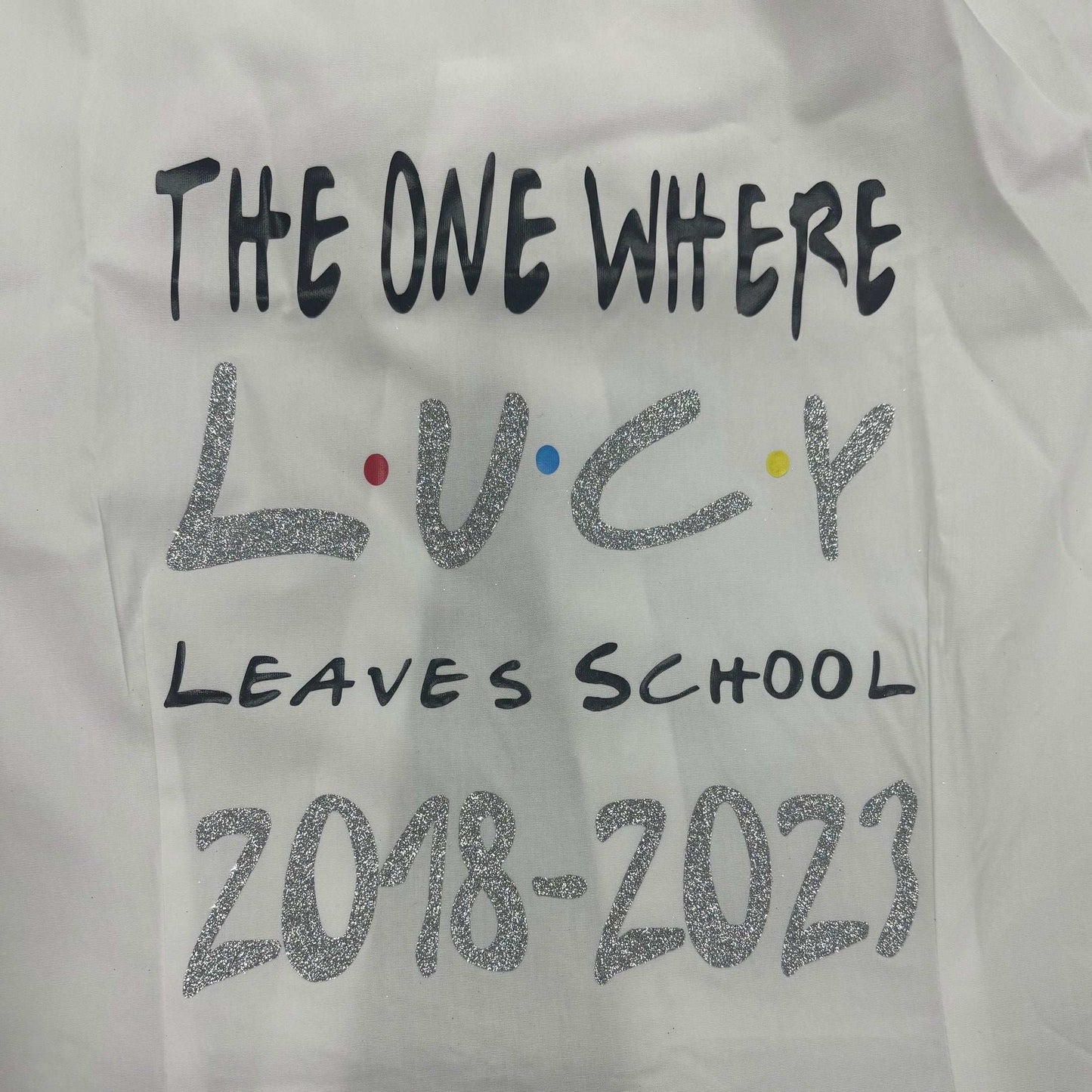 Make your last day of school one for the books with our Personalised Glitter Friends Leavers Signing Shirts for Class of 2025 kids. Capture memories of your amazing time at school with this beautiful keepsake. Our Glitter Friends Themed Design - The One Where Leaves School - is here to make it a fun and colorful farewell. Don't be afraid to shake things up and choose your own colors too (as long as they're available, of course)!