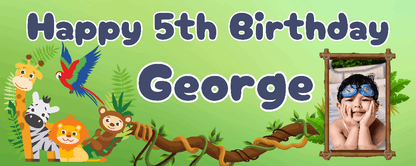 A jungle-themed birthday banner with the text 'HAPPY 5th BIRTHDAY GEORGE' surrounded by images of jungle animals and a photo of a young boy with the name 'GEORGE' on it.