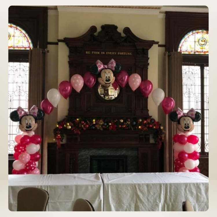 Minnie Mouse balloon arch and columns and balloons backdrop in Liverpool