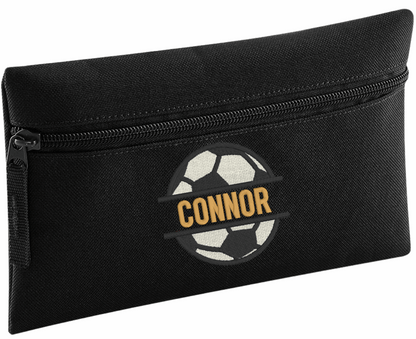 Stay organised in style with our Personalised Pencil Case, perfect for school, home, or work! Choose from a variety of vibrant colours, stylish design, and fun font designs to make it truly your own.

✨ Product Features

Spacious zipped main compartment – ideal for pens, pencils, markers, and more
Internal identification label – so it never gets lost
Customise with name&nbsp;and choice of font and football monogram design.
Choice of 8 colours. Durable, lightweight, and made for everyday use

🎨 Whether you'