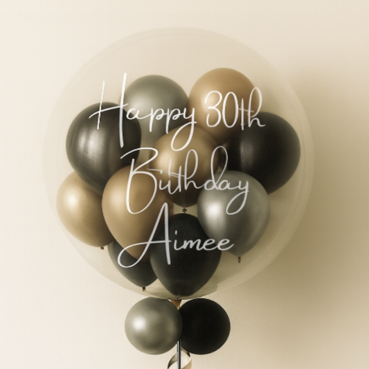 Personalised bubble balloon with silver, gold and black colour scheme.
