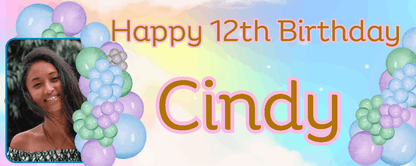 A personalized birthday banner for a 12th birthday featuring a photo of a smiling person with balloons and the name 'Cindy' in bold letters.