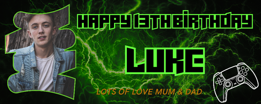 A gaming-themed birthday banner featuring a photo of a male individual with the name 'Luca' on it, surrounded by green neon light graphics, game controller icons, and the text 'Happy 13th Birthday'.
