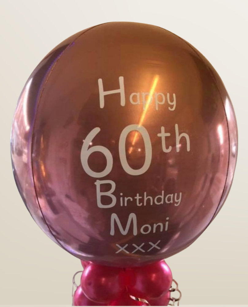 Personalised rose gold orbz helium filled birthday balloon.
