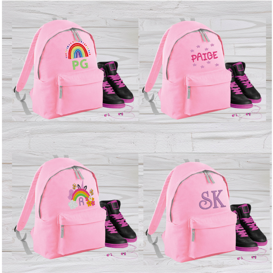 Our personalised Junior Pink School Rucksack Backpack has got it all: a zippered front pocket, comfy padded back panel, adjustable straps for extra support and a handy grab handle. Enjoy your schooldays in style! Going back to school with you very own personalised school bag.  Colour - Pink Rucksack Dimensions 28 x 38 x 19cm. Capacity 12 litres.   (Other colours Burgundy, French Navy, Black, Jungle Camo, Navy Blue, Fuchsia Pink, Purple, Red, Royal Blue, and Surf Blue - take your pick!)