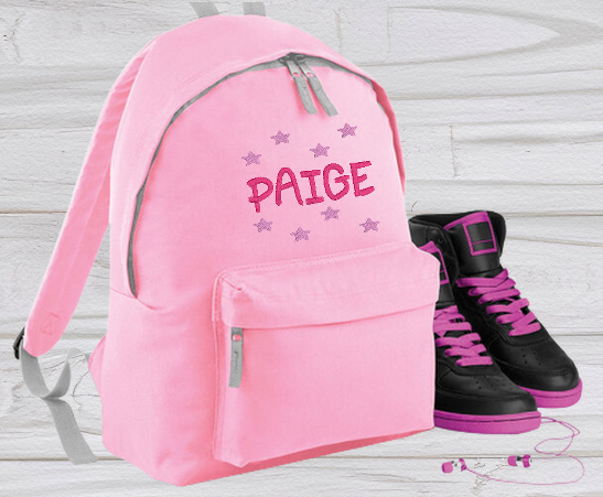 Our personalised Junior Pink School Rucksack Backpack has got it all: a zippered front pocket, comfy padded back panel, adjustable straps for extra support and a handy grab handle. Enjoy your schooldays in style! Going back to school with you very own personalised school bag.  Colour - Pink Rucksack Dimensions 28 x 38 x 19cm. Capacity 12 litres.   (Other colours Burgundy, French Navy, Black, Jungle Camo, Navy Blue, Fuchsia Pink, Purple, Red, Royal Blue, and Surf Blue - take your pick!)