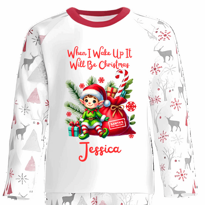Celebrate the magic of Christmas Eve in these snug personalised pyjamas, featuring a cute Sitting Elf and a festive Gift Bag. With the cheerful phrase “When I Wake Up It Will Be Christmas,” they capture the excitement of the countdown in the coziest, most delightful way.