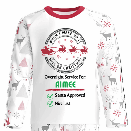 Christmas-themed pyjama set with Santa Claus design on a white background